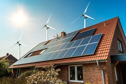 Solar Energy vs. Wind Power solar panels and wind turbines