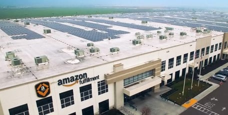 solar panels on roof of amazon fulfillment warehouse