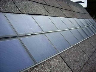 solar shingles on asphalt roof