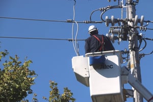 Utility Worker Working on Power LIne