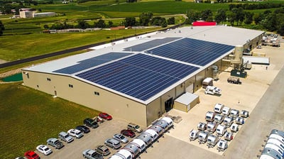 nuCamp RV manufacturing facility with solar panels