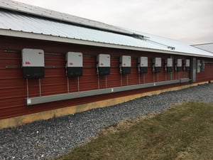 solar string inverters on a barn